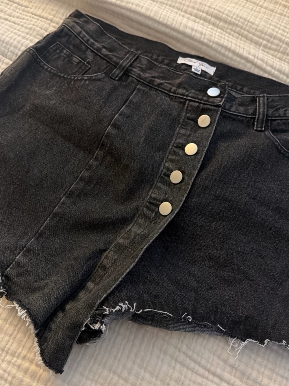 High-Rise Black Button-Front Denim Mini Skirt